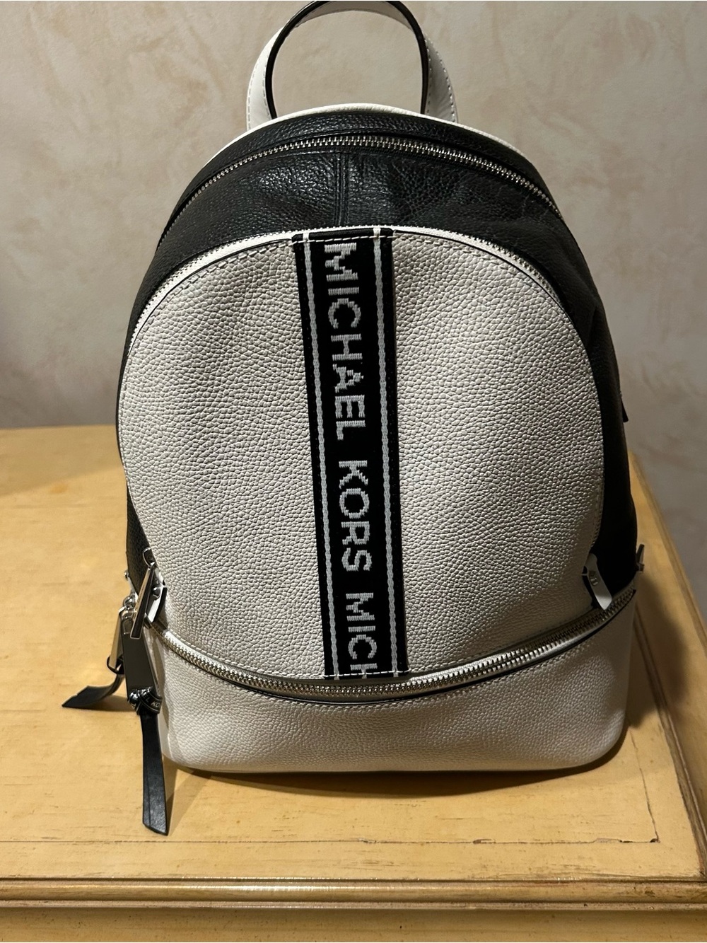 Michael Kors rhea zippered pebbled leather black and white logo backpack